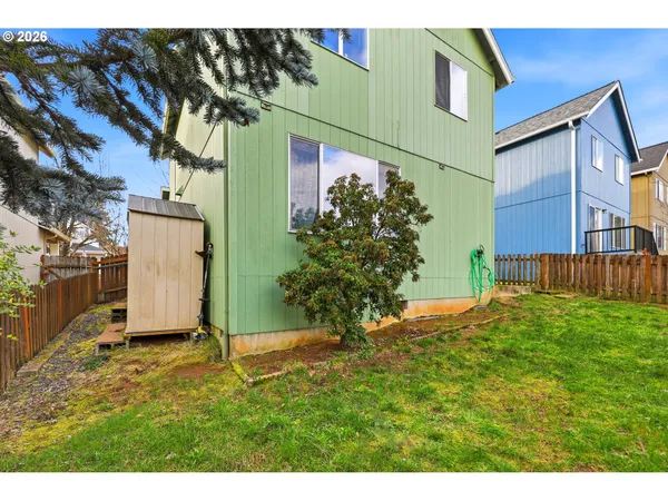 a backyard of a house with lots of green space