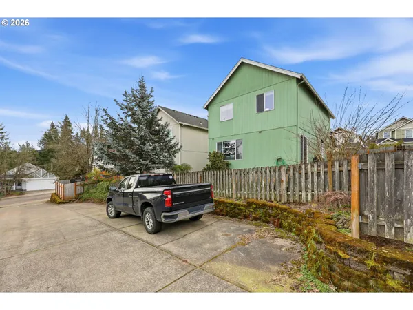 a car parked in front of a house