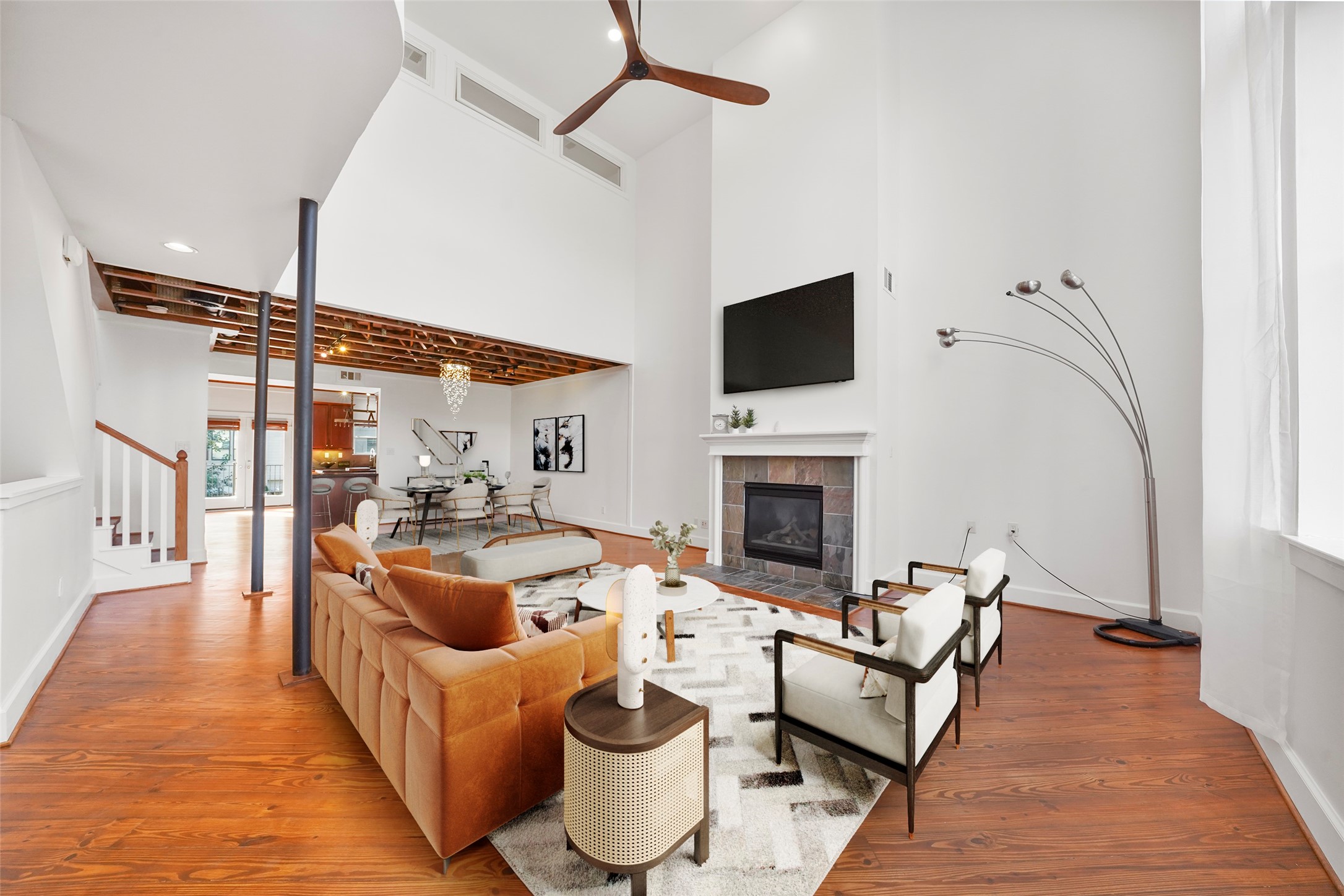 907 Hartman Street Houston, TX 77007 - Photo 14 of 34 a living room with furniture and a fireplace