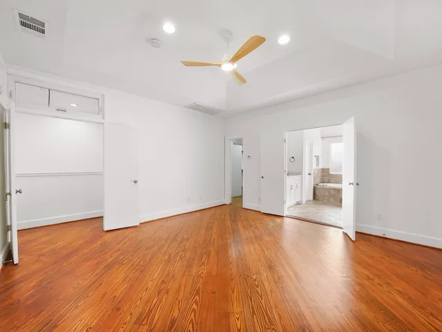 a view of a livingroom with wooden floor