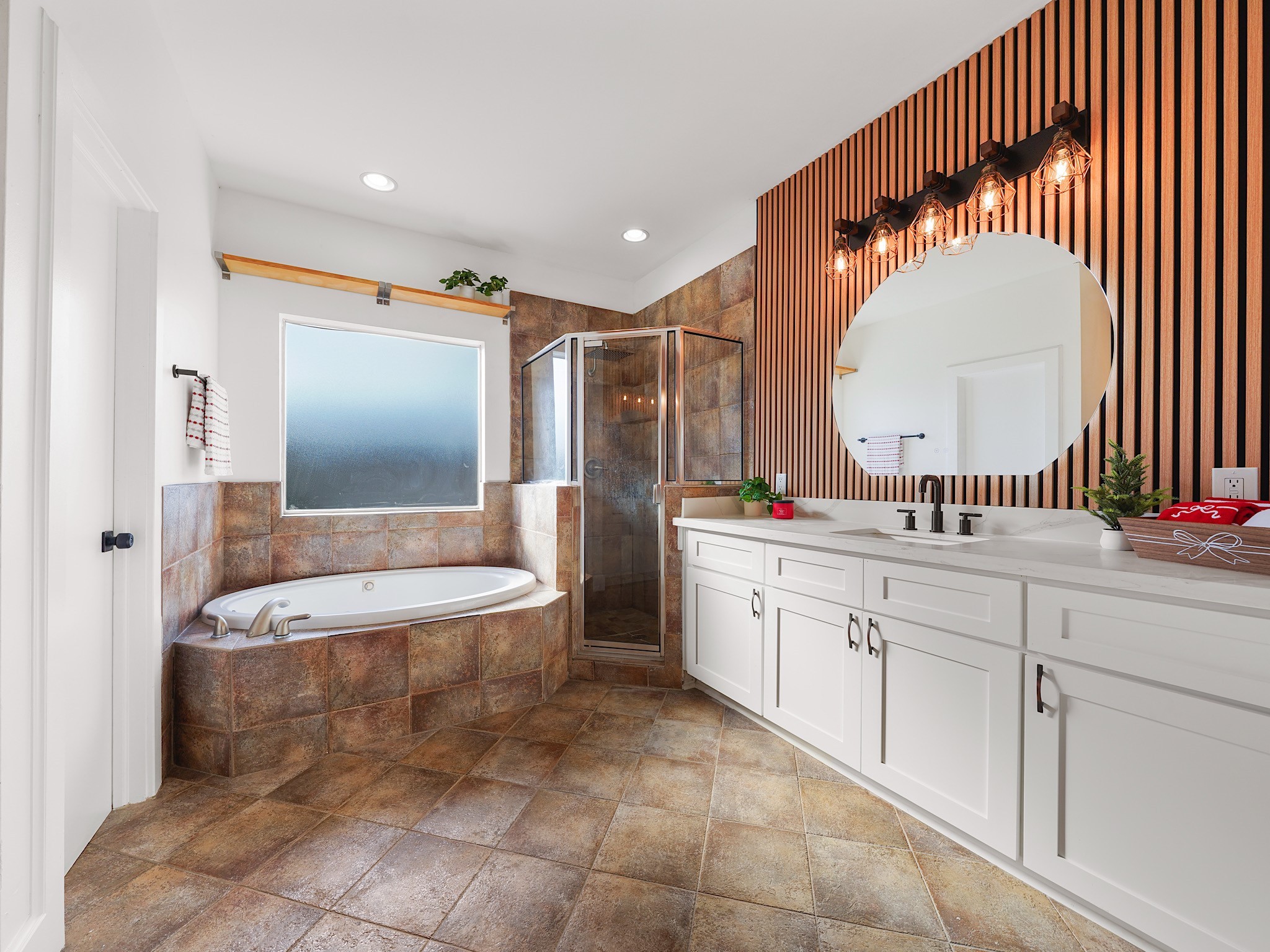 907 Hartman Street Houston, TX 77007 - Photo 28 of 34 a bathroom with a granite countertop sink mirror and bathtub