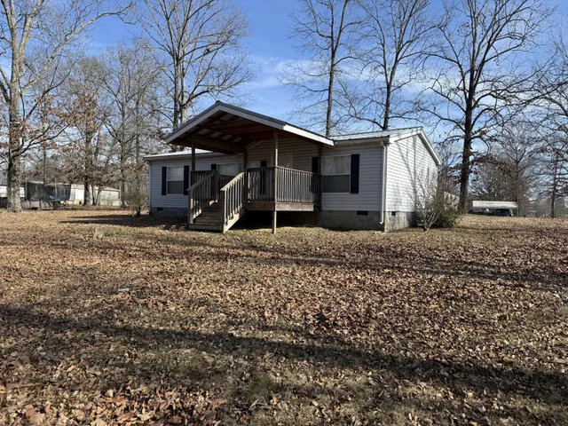 a house view with a outdoor space