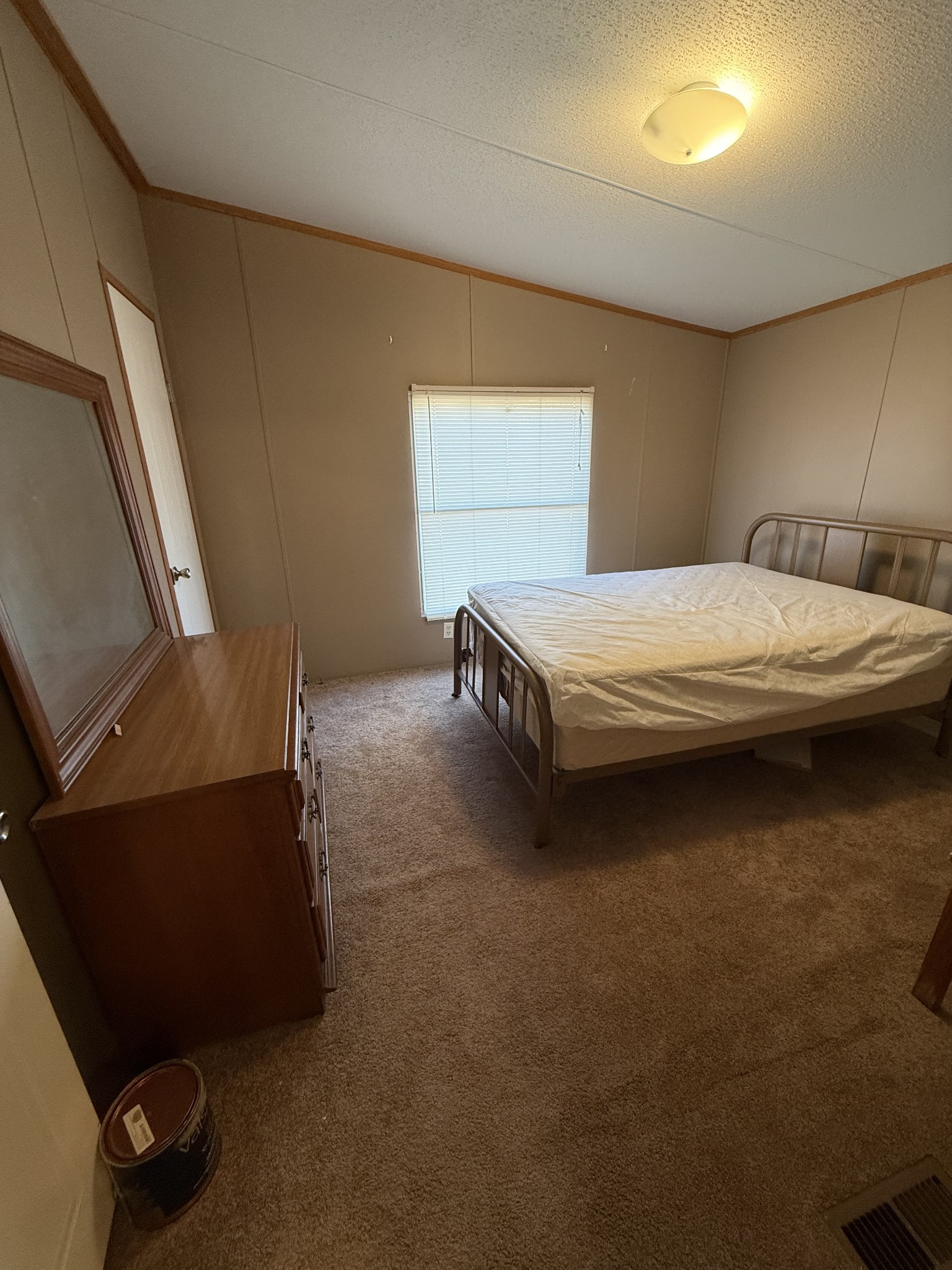 213 Alps Drive Hohenwald, TN 38462 - Photo 10 of 17 a bedroom with a bed and a window