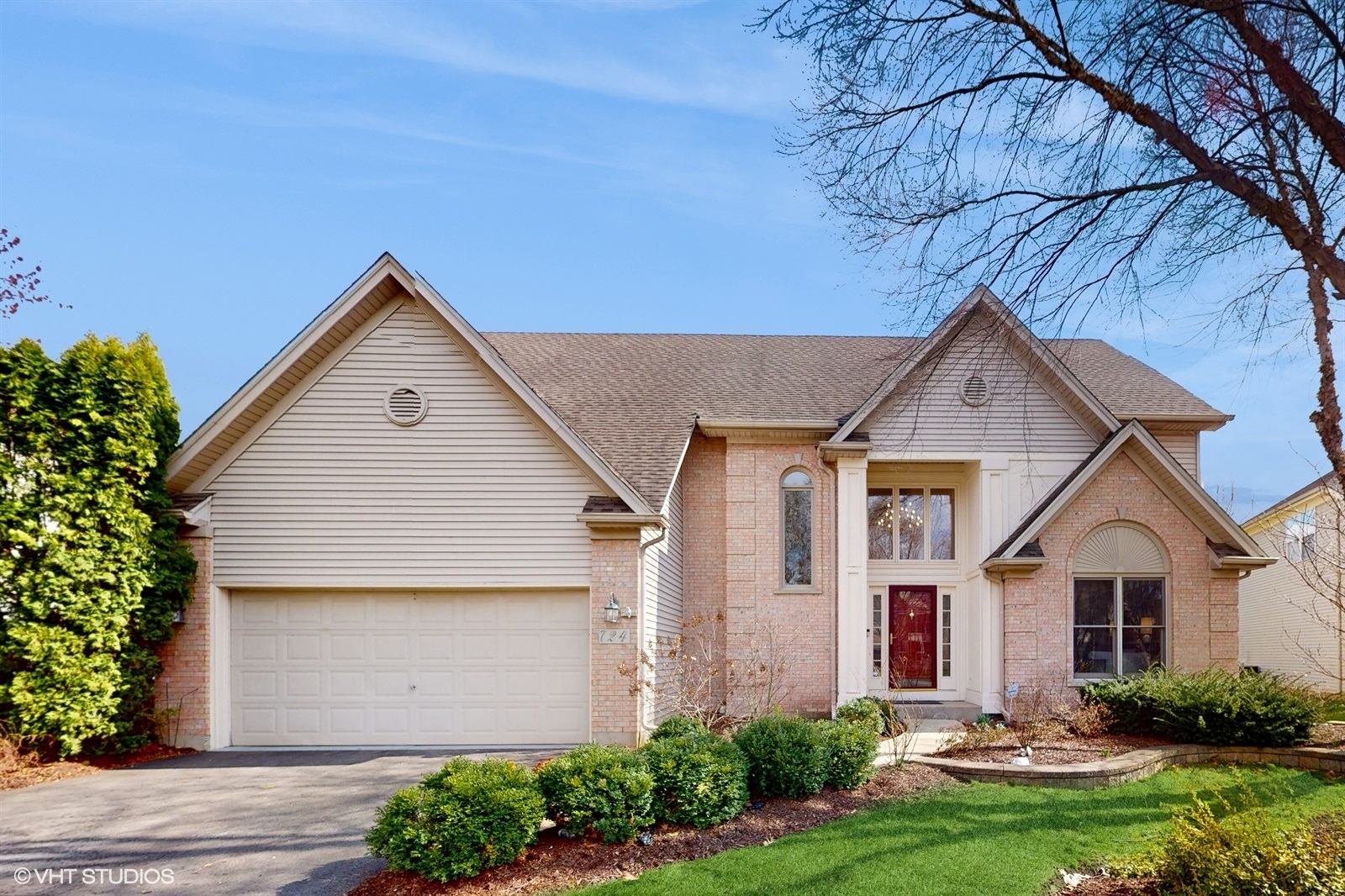 724 Sigmund Road Naperville, IL 60563 - Photo 1 of 44 a view of a yard in front of house