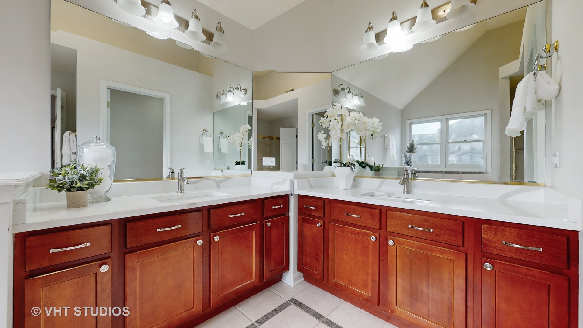 724 Sigmund Road Naperville, IL 60563 - Photo 25 of 44 a spacious bathroom with double sink and a mirror