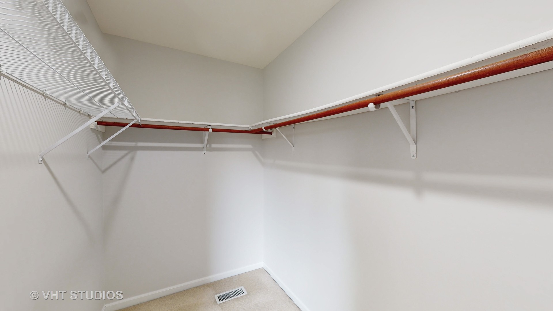 724 Sigmund Road Naperville, IL 60563 - Photo 27 of 44 a view of small space with racks on the wall