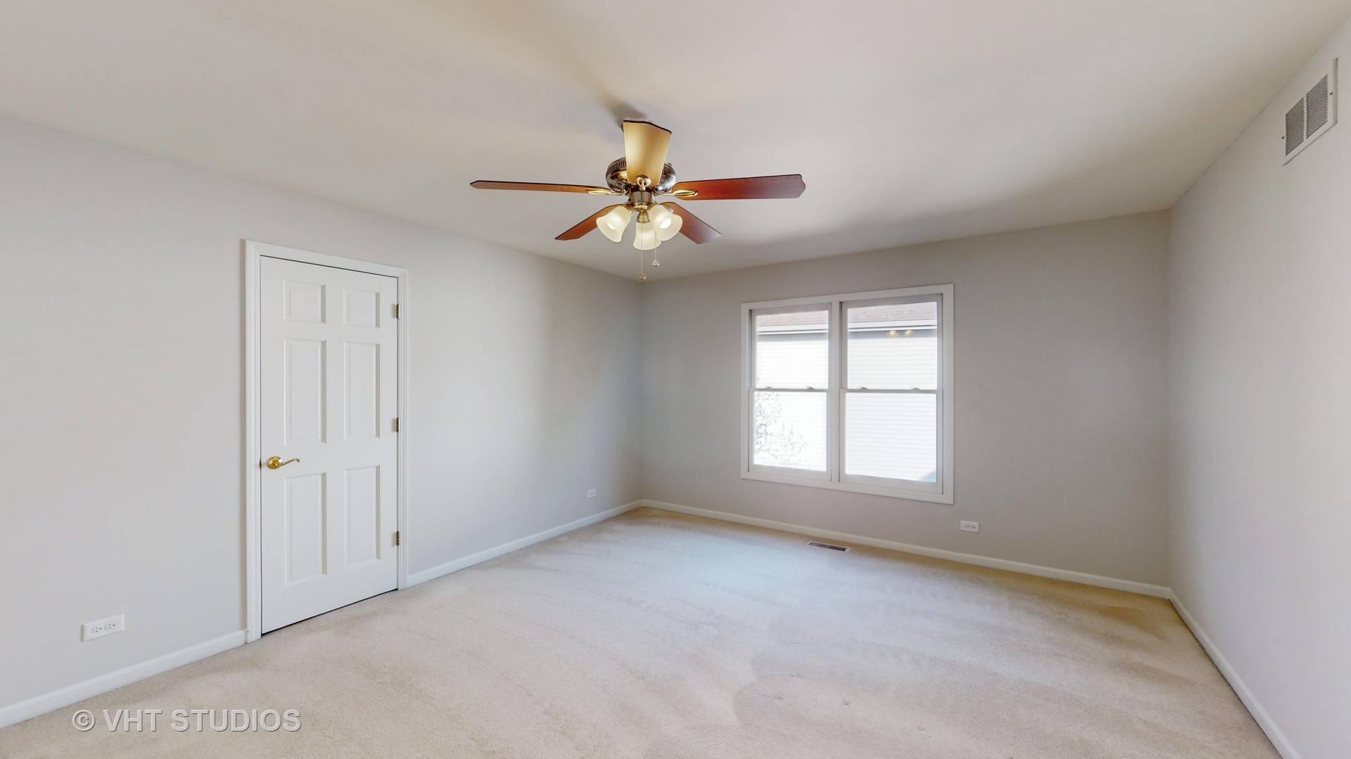 724 Sigmund Road Naperville, IL 60563 - Photo 32 of 44 wooden floor in an empty room with a window