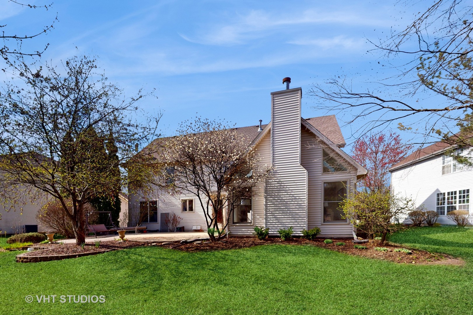 724 Sigmund Road Naperville, IL 60563 - Photo 40 of 44 a front view of a house with a yard