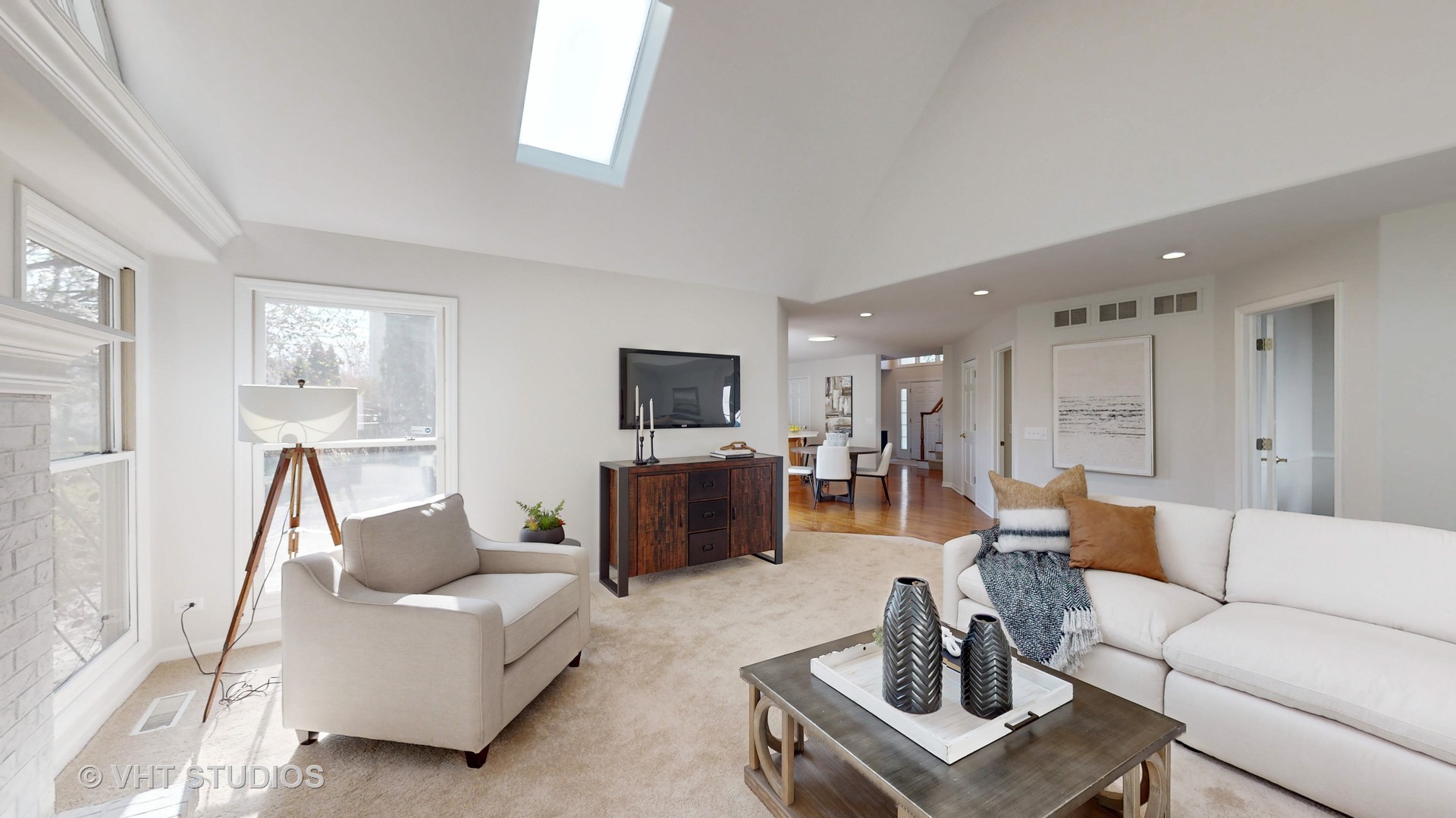 724 Sigmund Road Naperville, IL 60563 - Photo 6 of 44 a living room with furniture and a flat screen tv