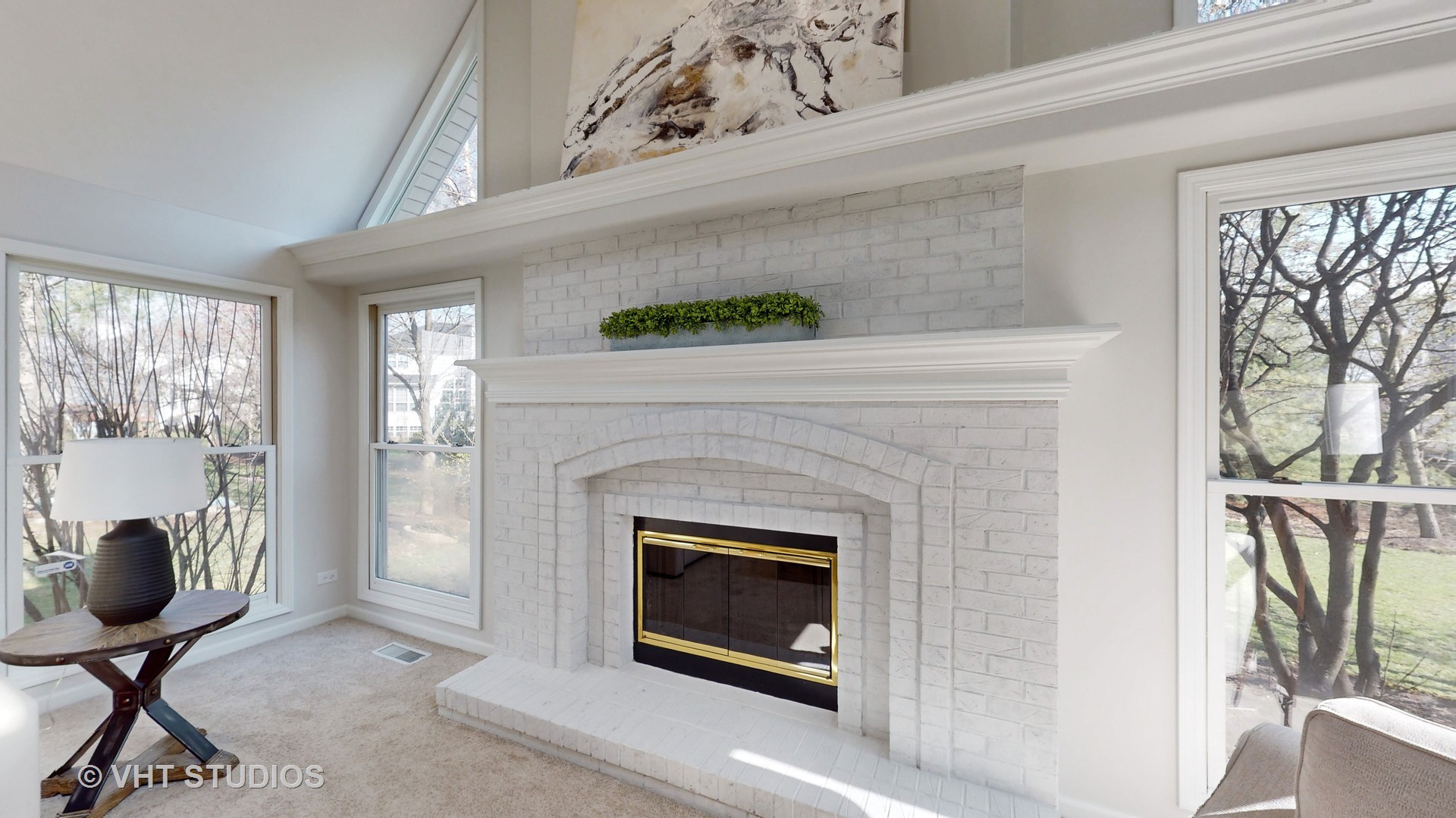 724 Sigmund Road Naperville, IL 60563 - Photo 8 of 44 a living room with furniture and a fireplace