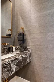 a white bath tub sitting in a bathroom