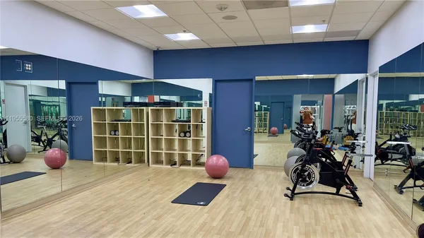 a room with furniture and flowers