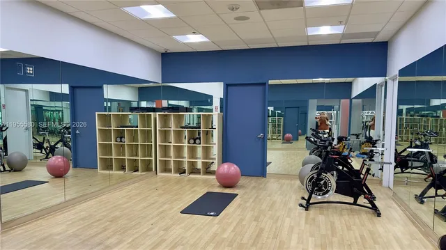 a room with furniture and flowers