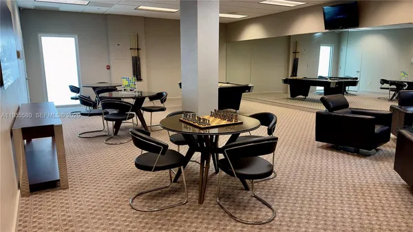 a dining room with furniture