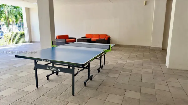 a view of a workspace with furniture