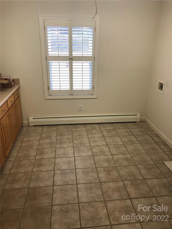 305 McCall Road Ellerbe, NC 28338 - Photo 4 of 14 a view of an empty room and window
