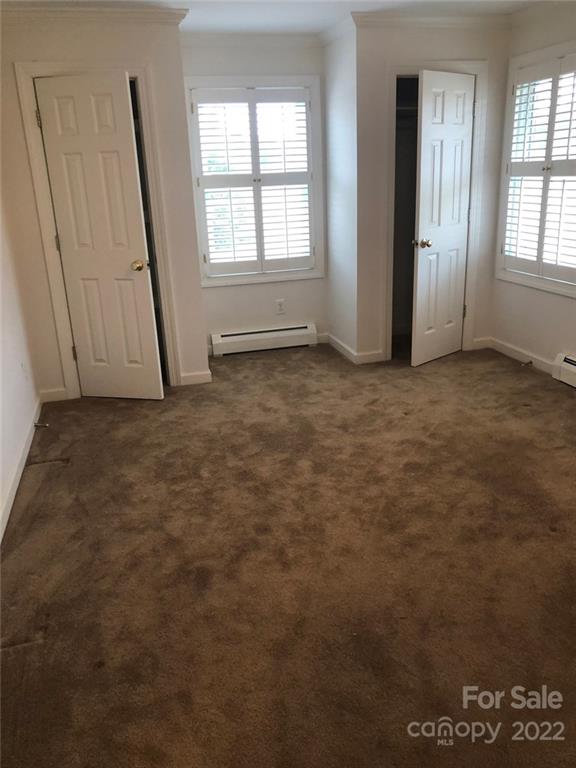 305 McCall Road Ellerbe, NC 28338 - Photo 8 of 14 an empty room with windows