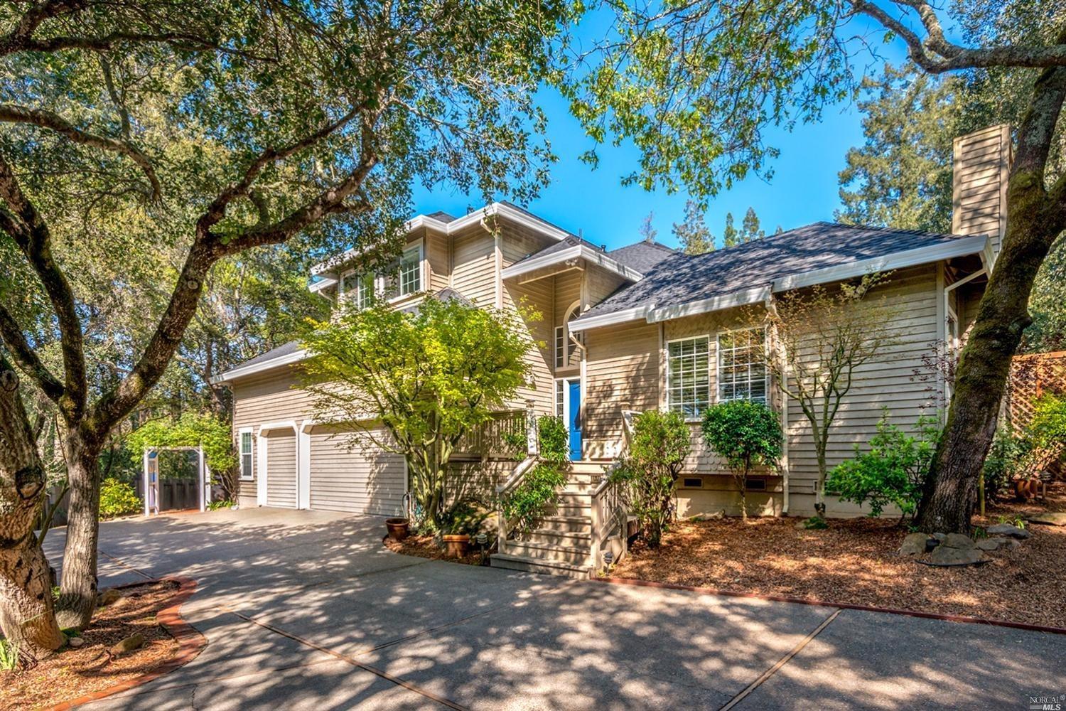 3119 Montecito Meadow Drive Santa Rosa, CA 95404 - Photo 1 of 1 a view of a house with a tree in the background
