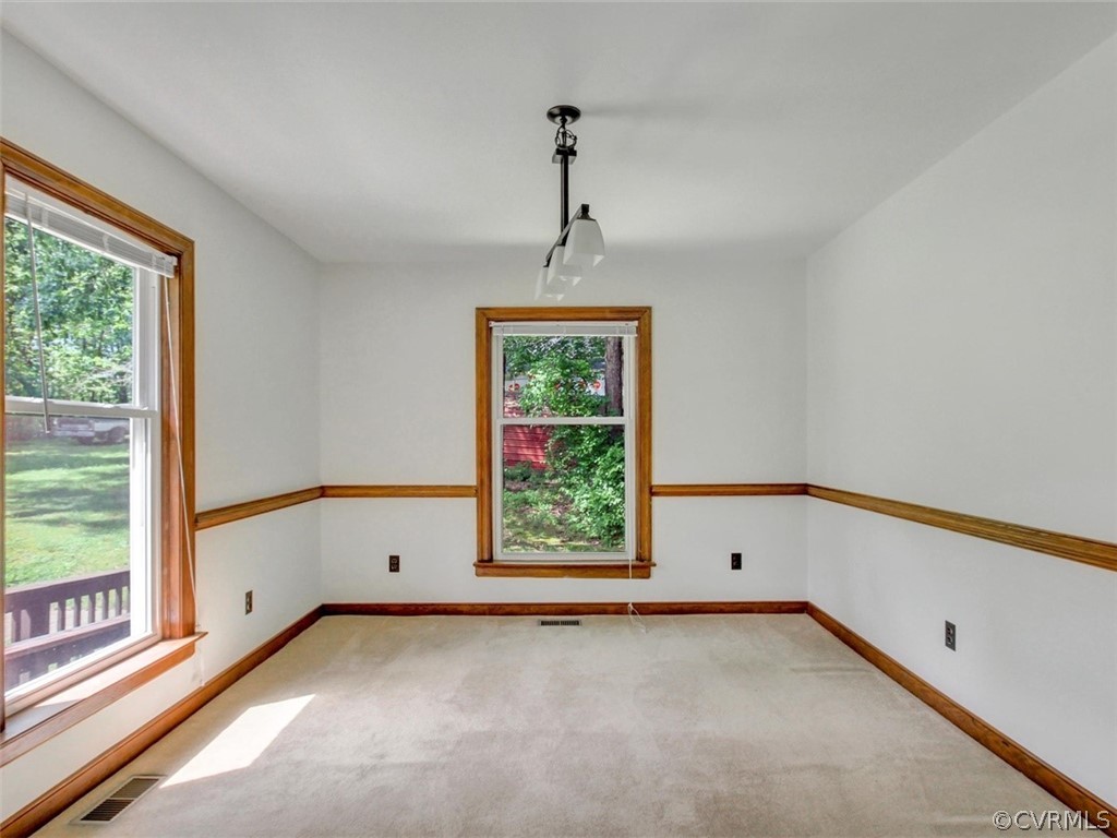 9020 Belmont Road Chesterfield, VA 23832 - Photo 8 of 41 Well Lit Dining Room Overlooking Front Porch