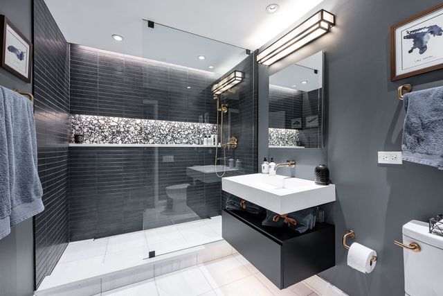 850 West Adams Street, Unit 6E Chicago, IL 60607 - Photo 11 of 14 a bathroom with a sink a shower and a mirror