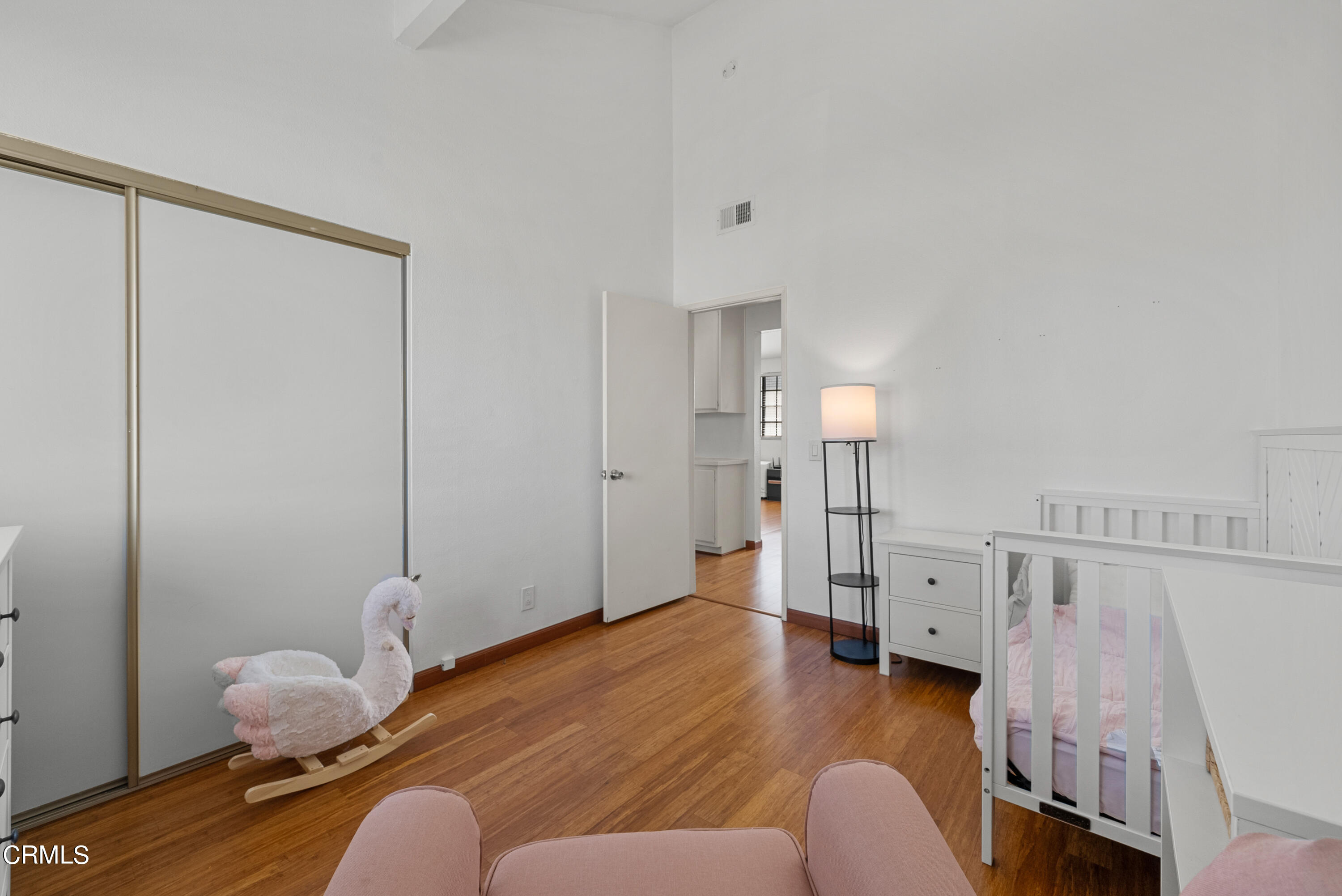 3450 Olds Road Oxnard, CA 93033 - Photo 17 of 30 a bedroom with furniture and wooden floor
