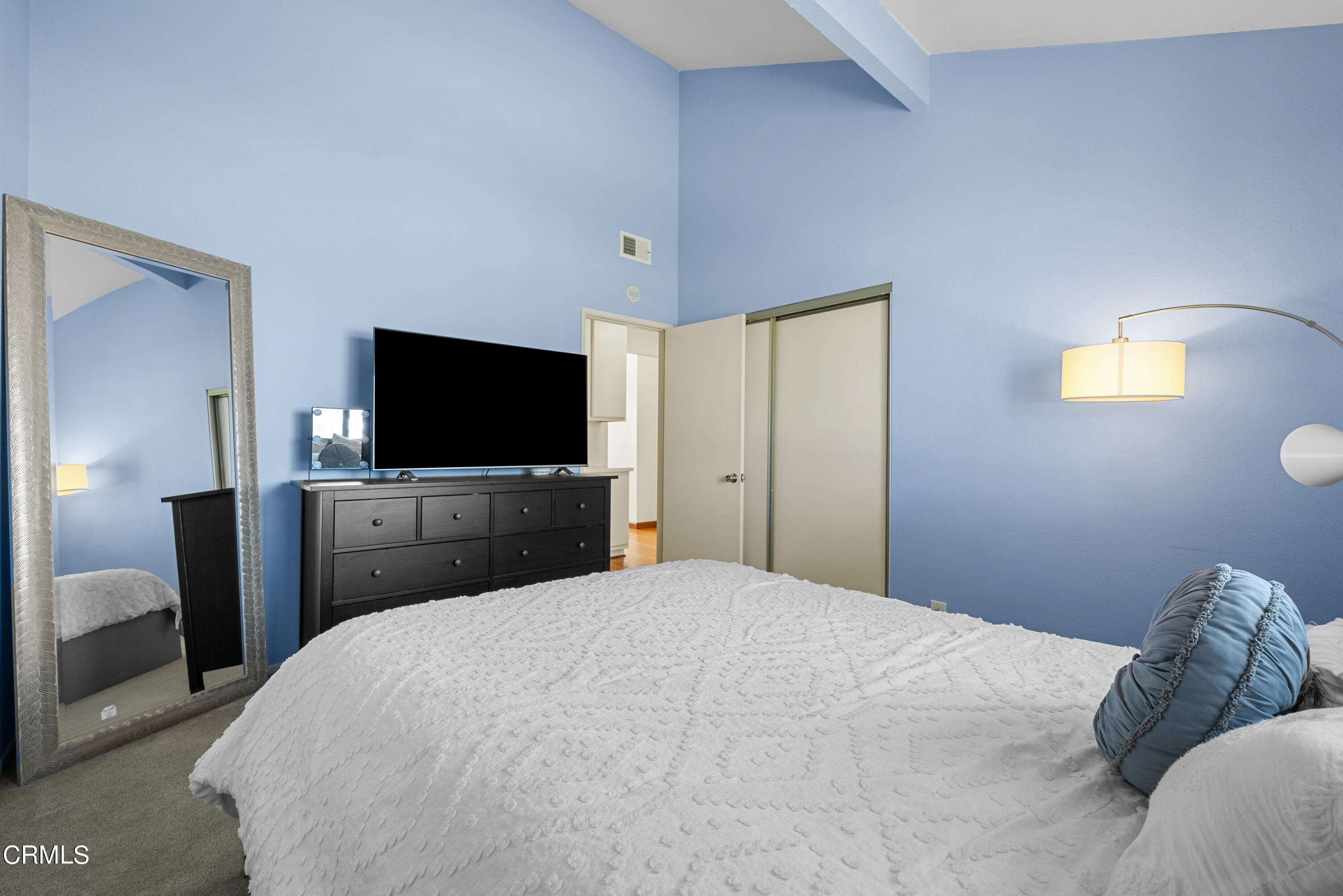 3450 Olds Road Oxnard, CA 93033 - Photo 19 of 30 a bedroom with a bed and a flat screen tv