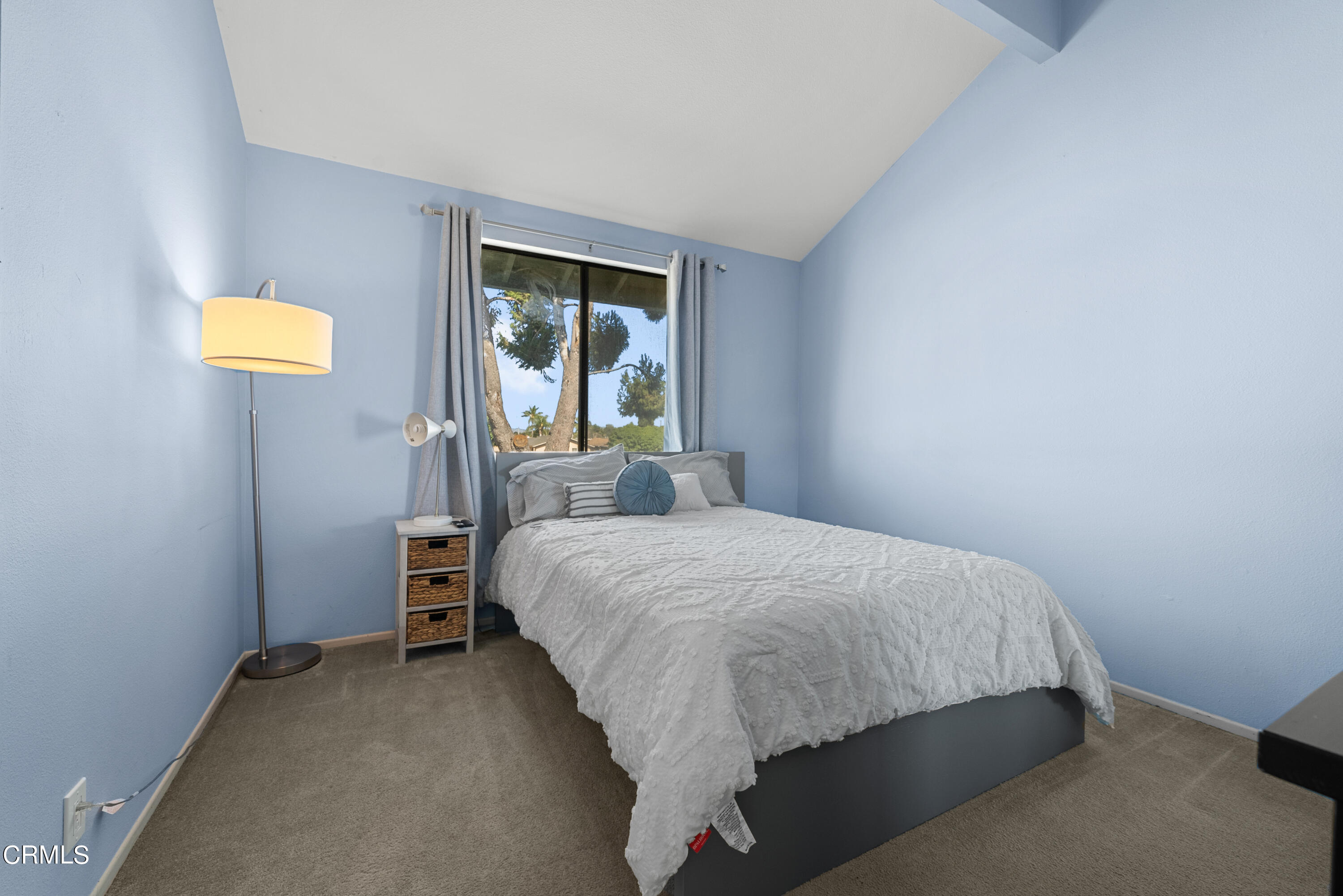 3450 Olds Road Oxnard, CA 93033 - Photo 20 of 30 a bed sitting in a bedroom next to a window