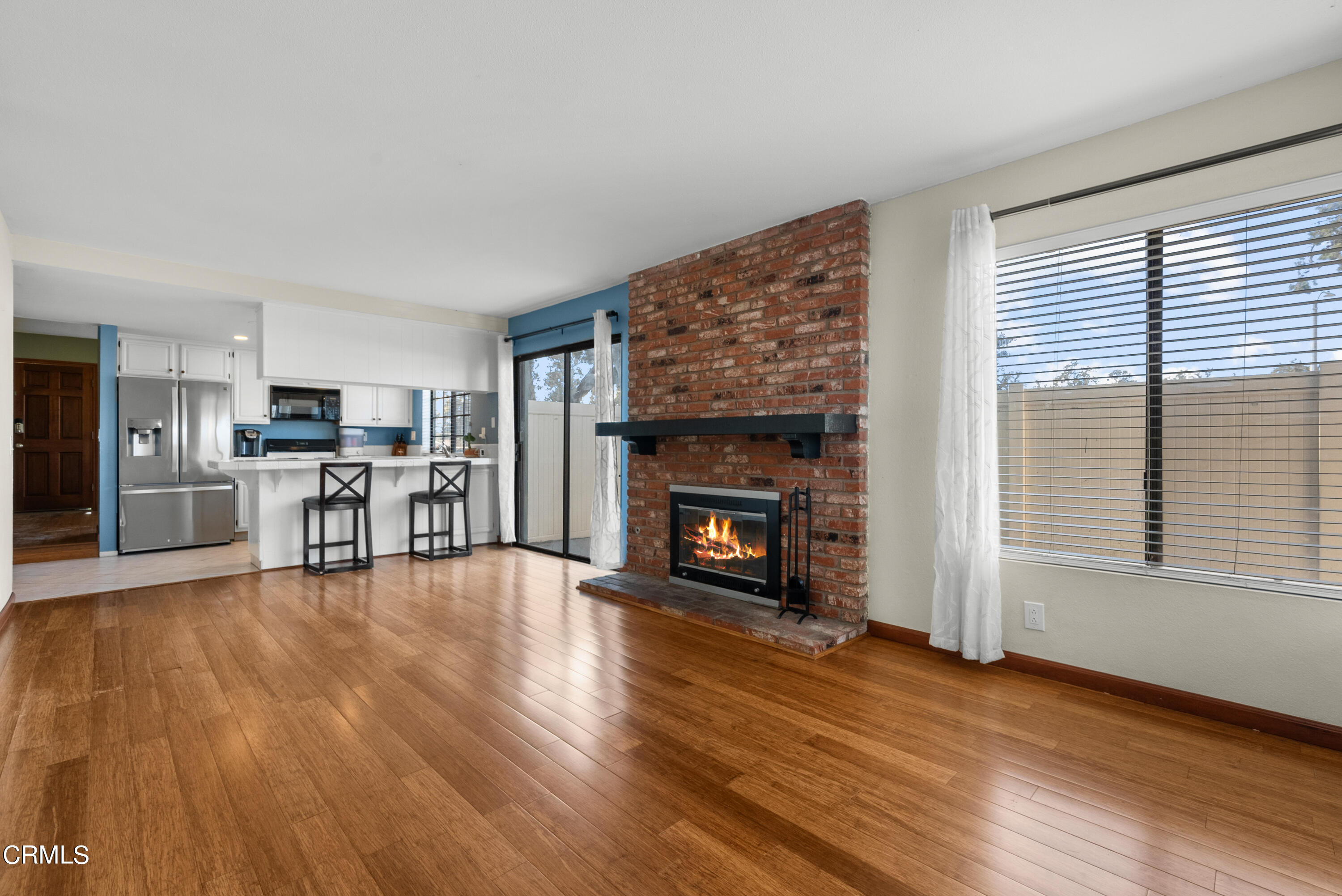 3450 Olds Road Oxnard, CA 93033 - Photo 10 of 30 a living room with furniture and a fireplace