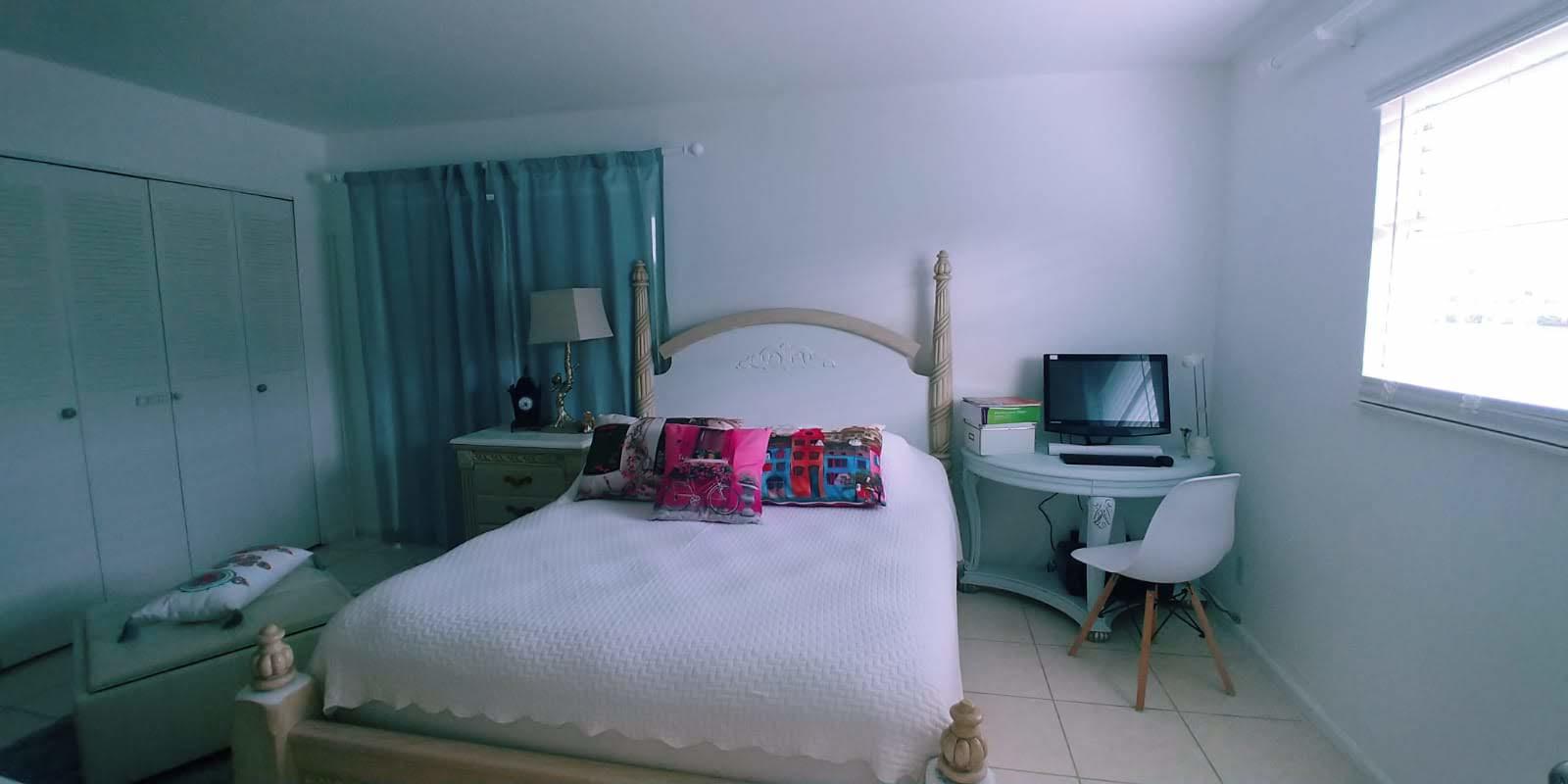 95 Monaco Boulevard, Unit B Delray Beach, FL 33446 - Photo 16 of 46 a living room with furniture and a window