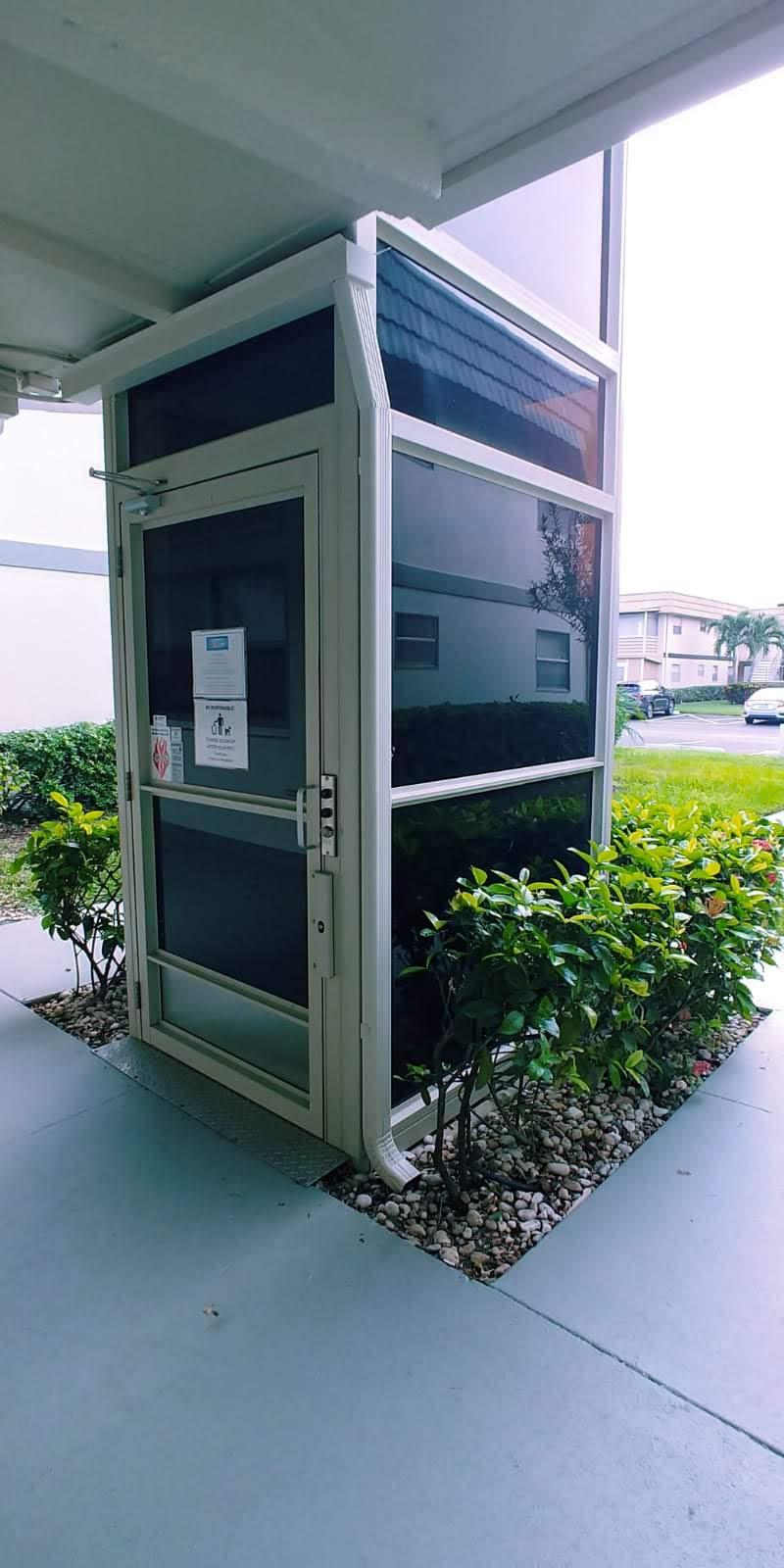 95 Monaco Boulevard, Unit B Delray Beach, FL 33446 - Photo 34 of 46 a front view of a house with a yard