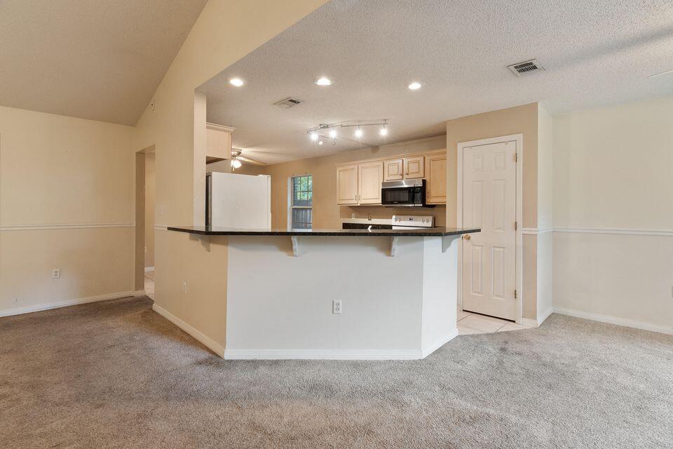 209 Warrior Street Crestview, FL 32536 - Photo 6 of 18 a view of a kitchen with a sink