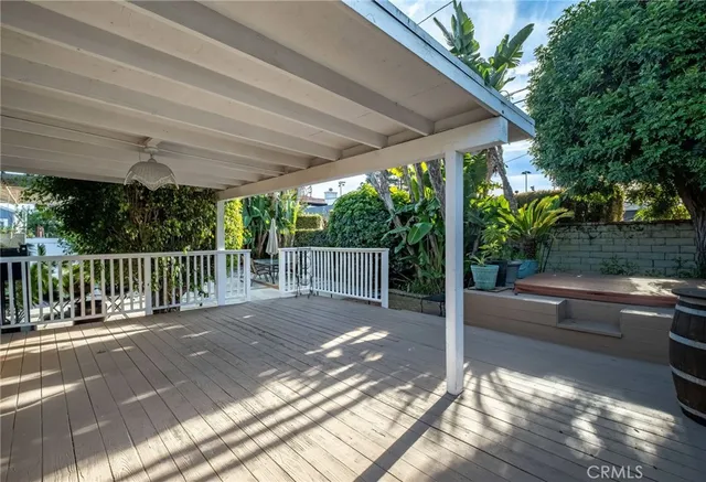 a view of a backyard with sitting area