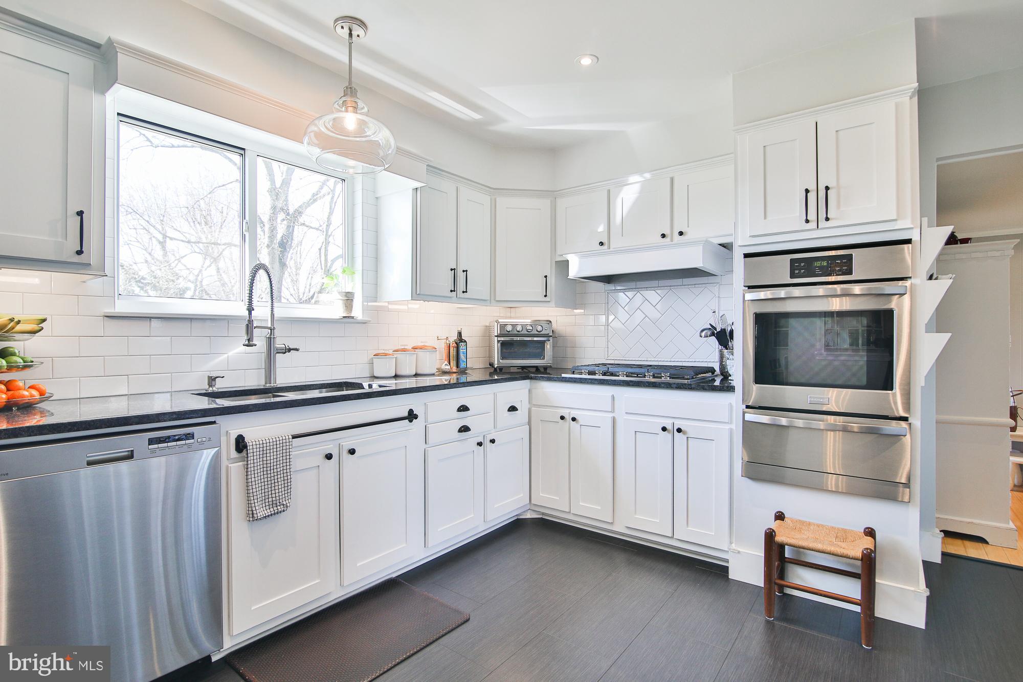 897 Longstreth Road Warminster, PA 18974 - Photo 11 of 48 White cabinets, new granite, stainless appliances