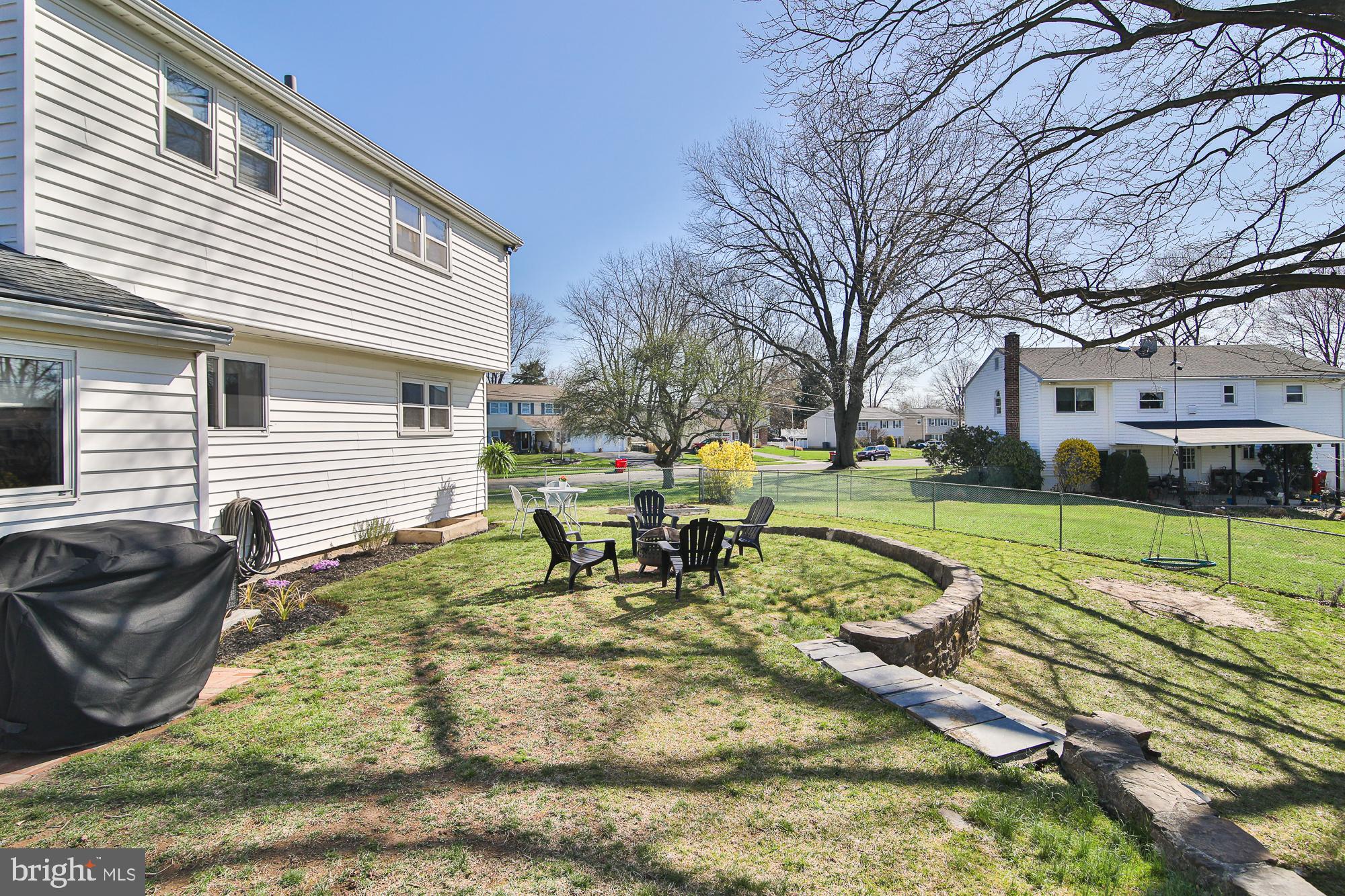 897 Longstreth Road Warminster, PA 18974 - Photo 39 of 48 Back yard with stone wall