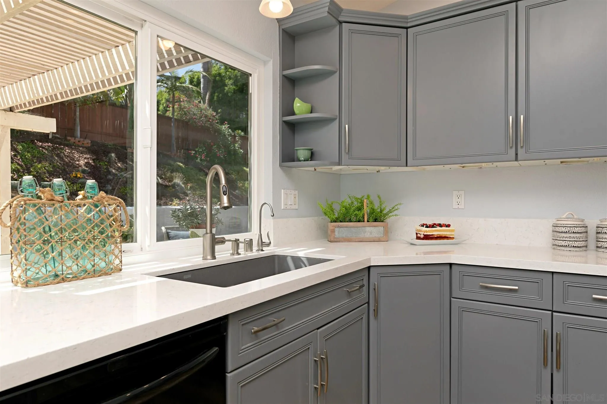 574 Gardendale Road Encinitas, CA 92024 - Photo 12 of 53 a kitchen with a sink and a window