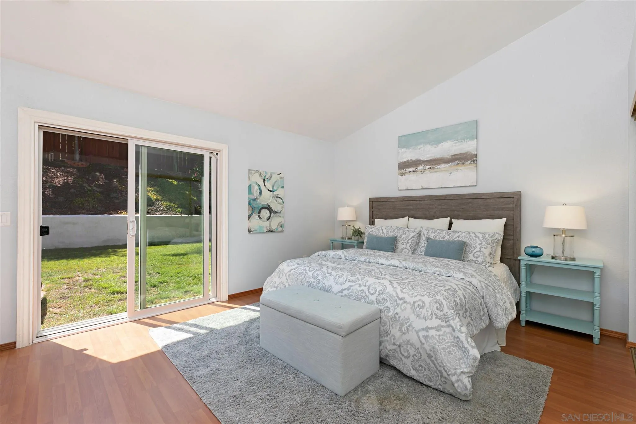 574 Gardendale Road Encinitas, CA 92024 - Photo 18 of 53 a bedroom with a bed and a large window