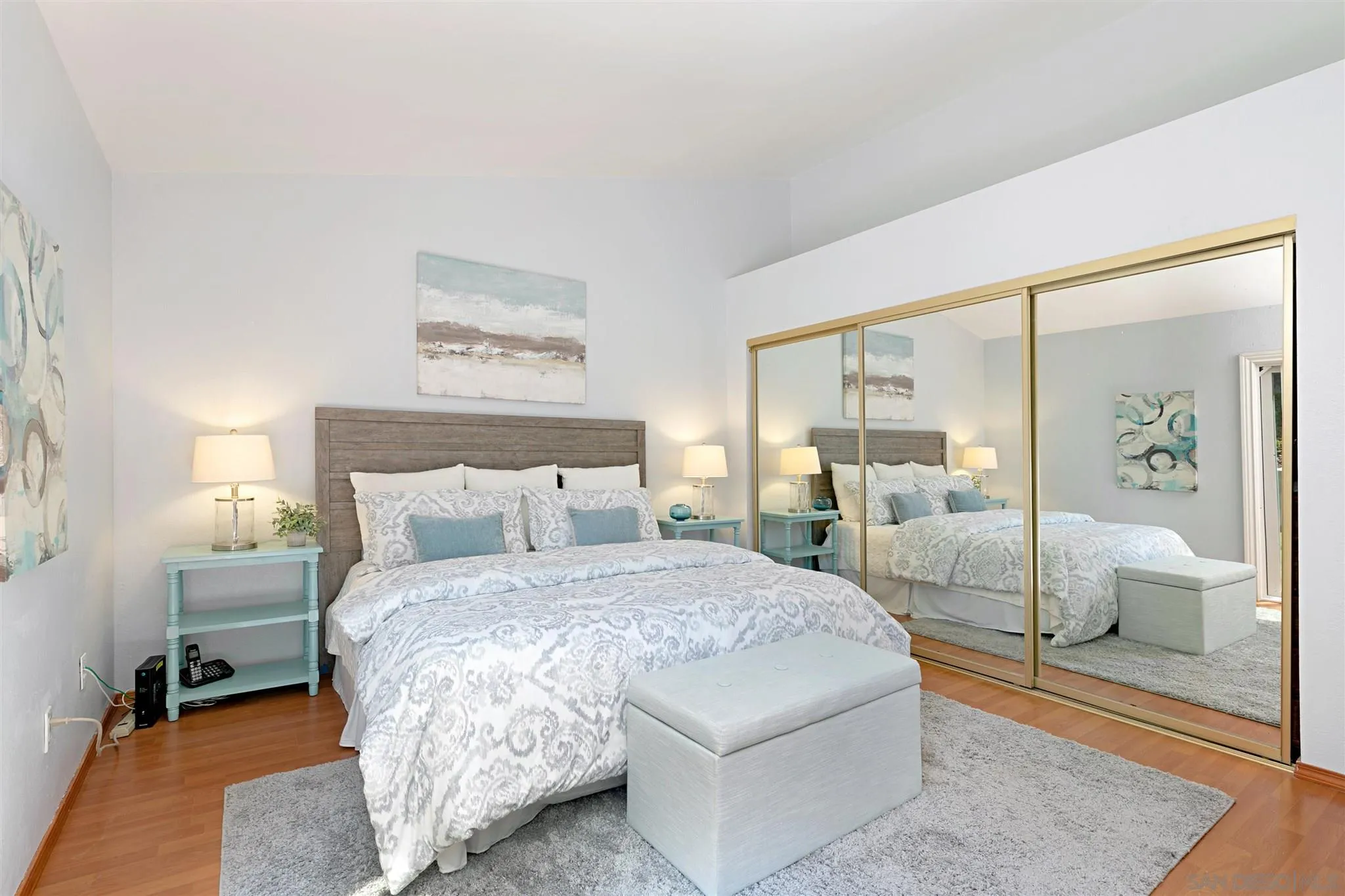 574 Gardendale Road Encinitas, CA 92024 - Photo 19 of 53 a bedroom with a large bed and a rug