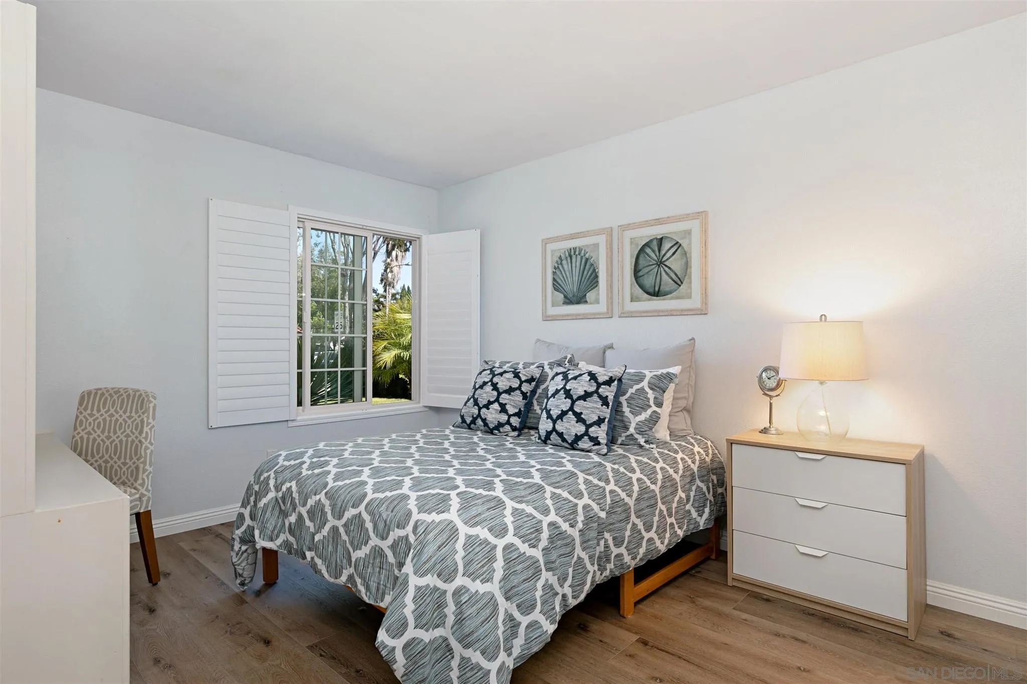 574 Gardendale Road Encinitas, CA 92024 - Photo 23 of 53 a bedroom with a bed and a window