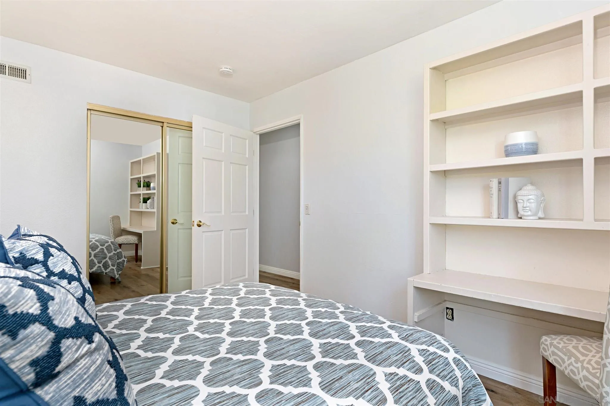 574 Gardendale Road Encinitas, CA 92024 - Photo 24 of 53 a bedroom with a bed and a window