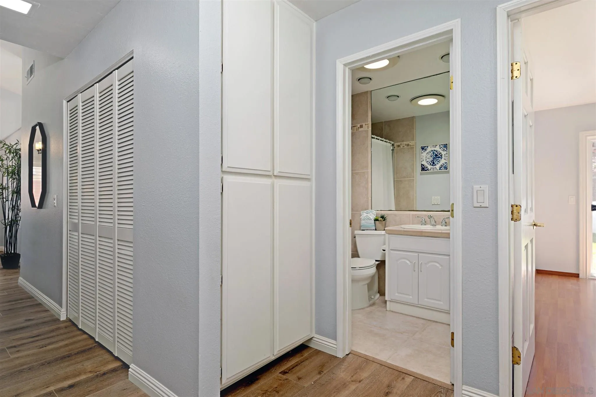 574 Gardendale Road Encinitas, CA 92024 - Photo 25 of 53 a bathroom with a granite countertop sink