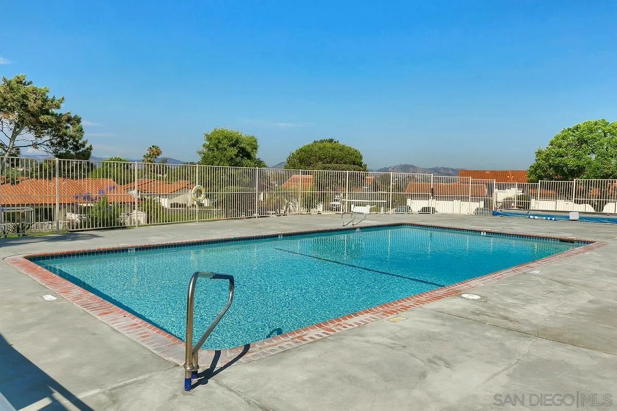 574 Gardendale Road Encinitas, CA 92024 - Photo 33 of 53 a view of a swimming pool with a lawn chairs