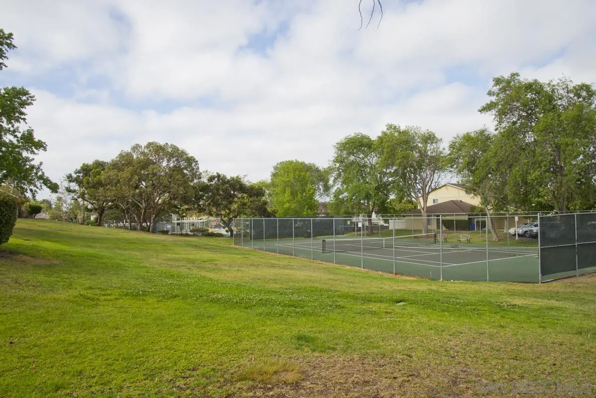 574 Gardendale Road Encinitas, CA 92024 - Photo 46 of 53 a view of a golf course with a lake