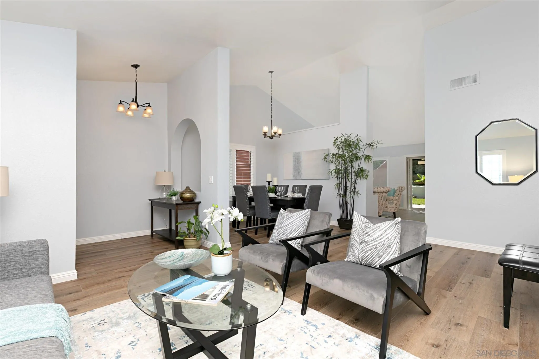 574 Gardendale Road Encinitas, CA 92024 - Photo 6 of 53 a living room with furniture a dining table and chairs