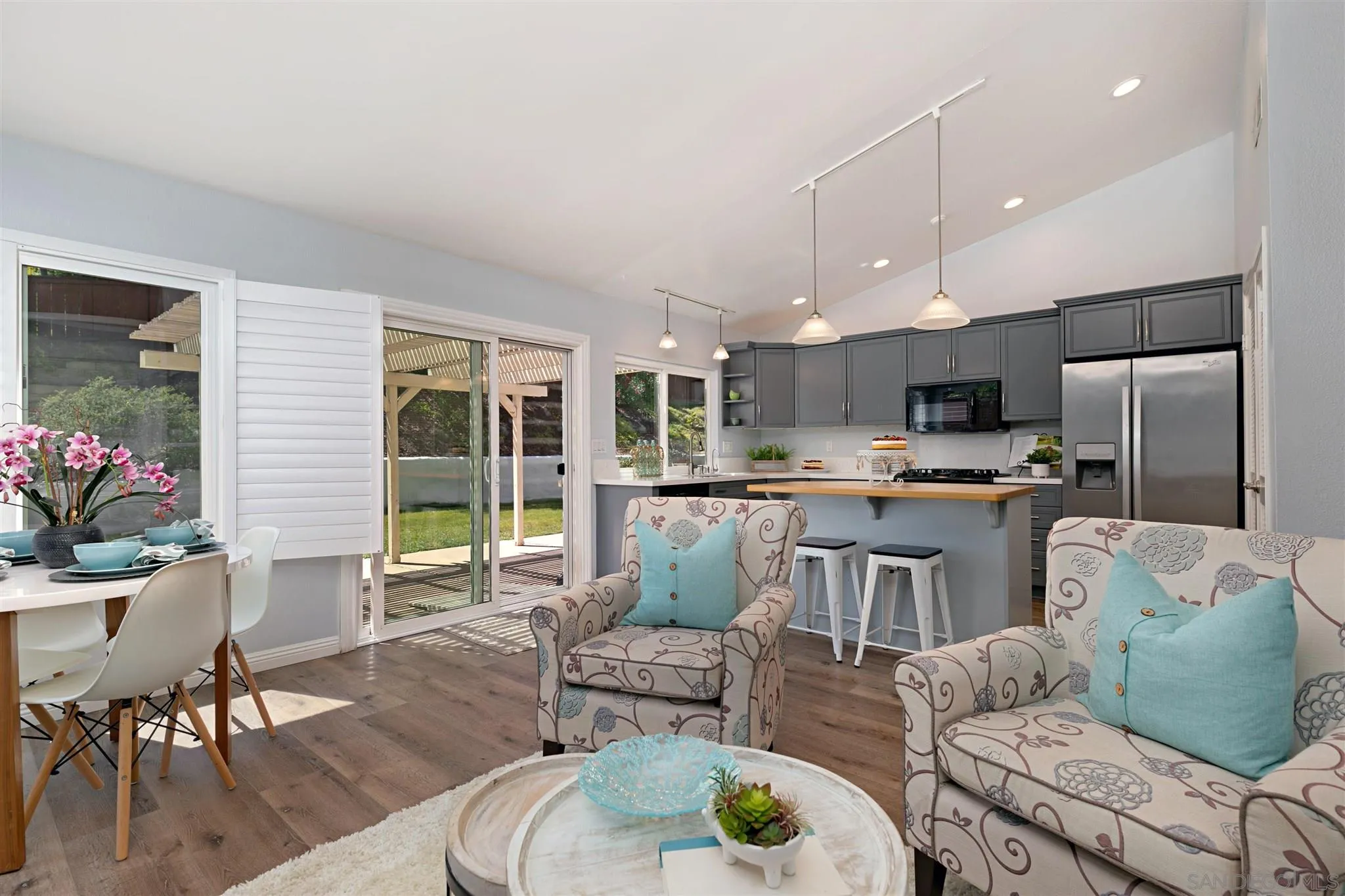 574 Gardendale Road Encinitas, CA 92024 - Photo 10 of 53 a living room with furniture kitchen and a large window