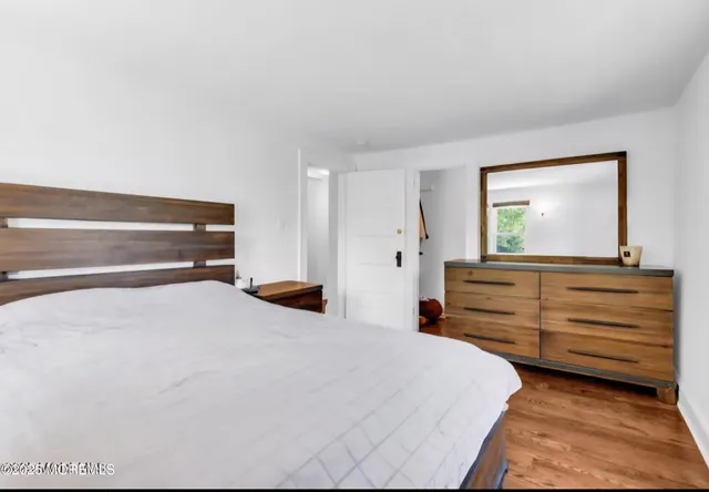 a kitchen with stainless steel appliances a refrigerator a sink a stove a microwave and cabinets