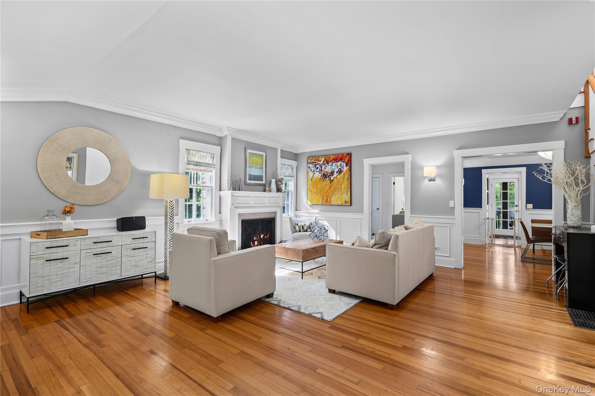 131 Douglas Road Chappaqua, NY 10514 - Photo 3 of 26 a living room with furniture and a fireplace