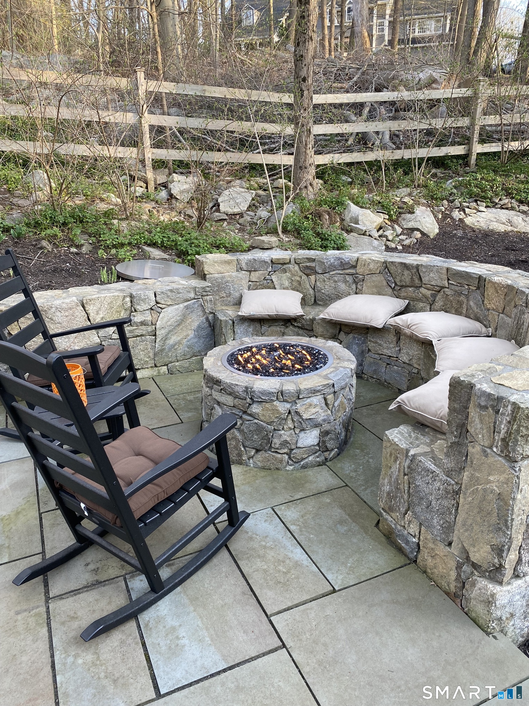 250 Ivy Hill Road Ridgefield, CT 06877 - Photo 13 of 45 a view of a chairs and table in a patio