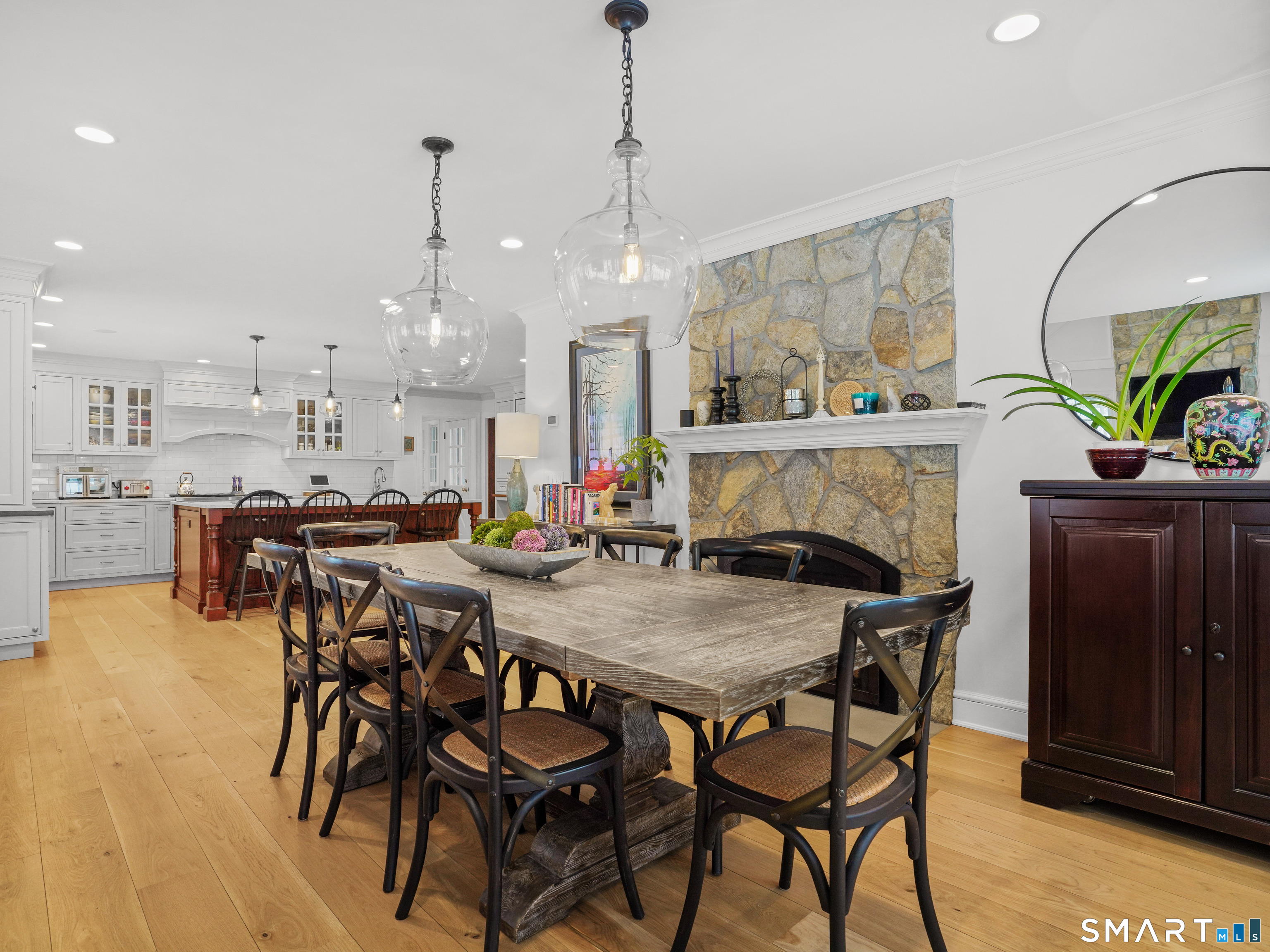 250 Ivy Hill Road Ridgefield, CT 06877 - Photo 18 of 45 a view of a dining room with furniture and wooden floor