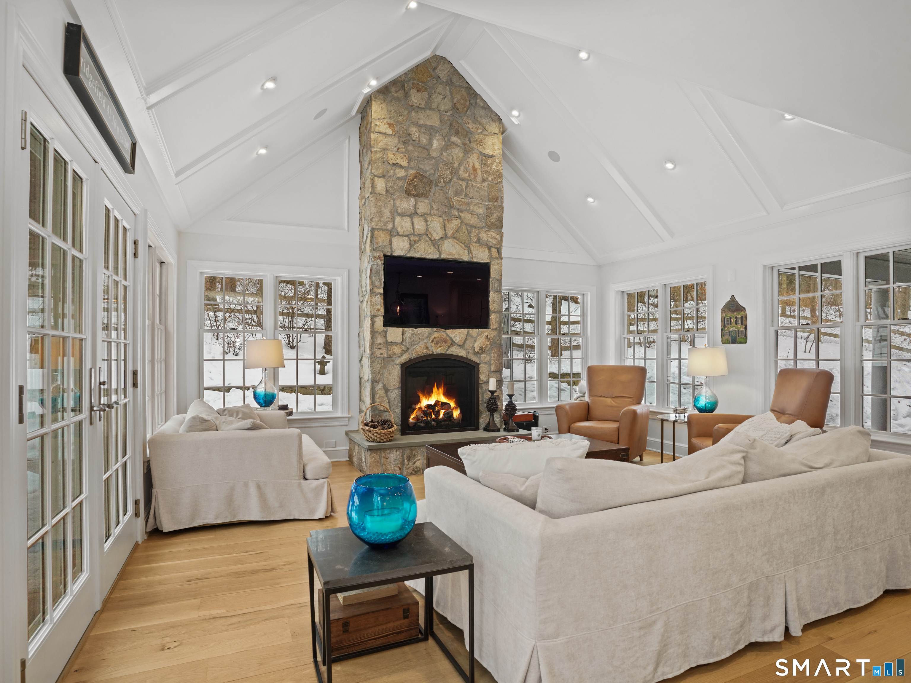 250 Ivy Hill Road Ridgefield, CT 06877 - Photo 20 of 45 a living room with furniture and a fireplace