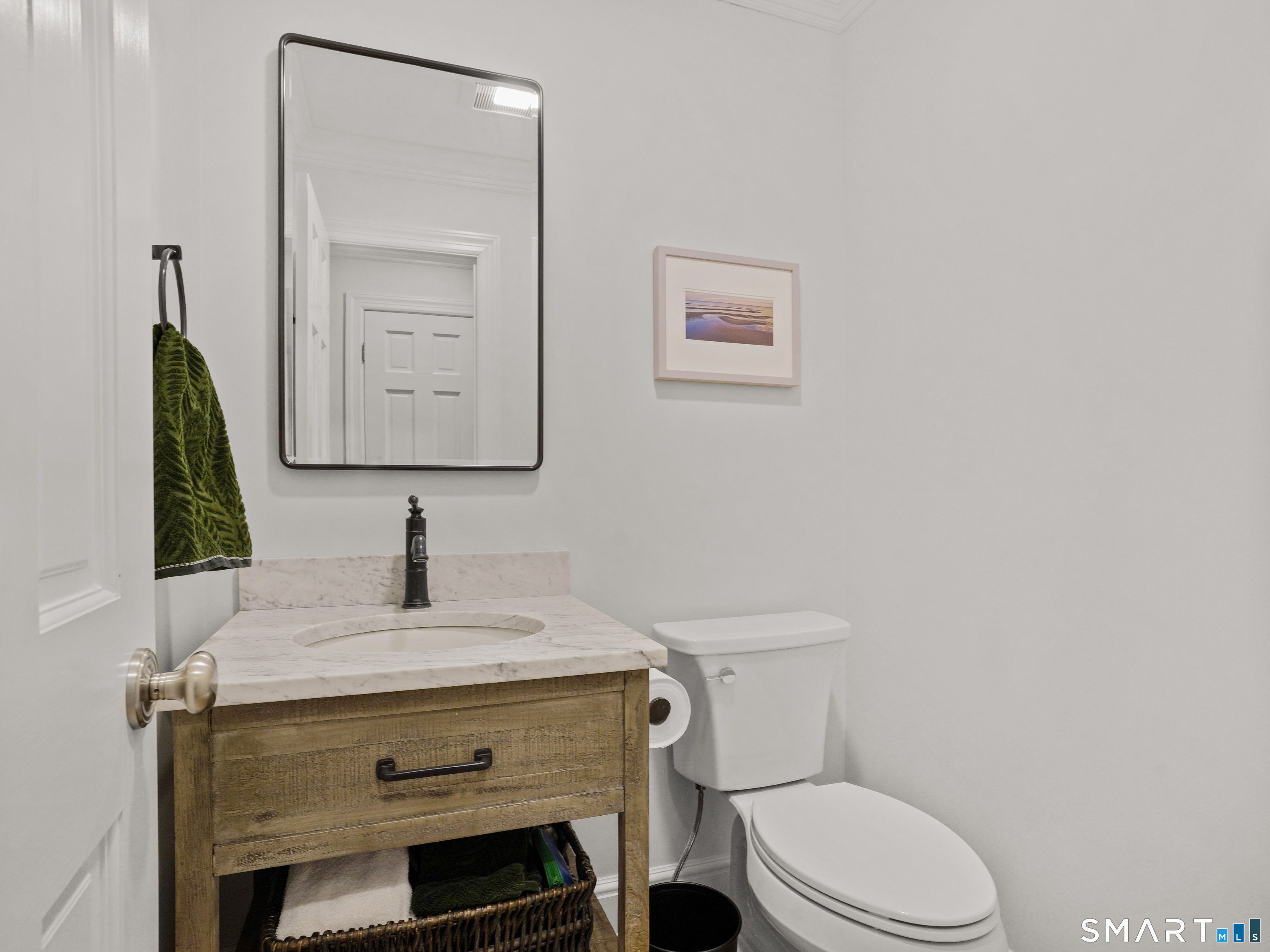 250 Ivy Hill Road Ridgefield, CT 06877 - Photo 22 of 45 a bathroom with a granite countertop toilet sink and mirror